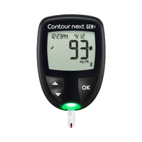 A photo of the CONTOUR®NEXT GEN Blood Glucose Meter displaying a green light where there is a CONTOUR®NEXT Test Strip inserted into it