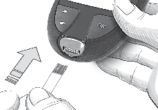 Inserting test strip